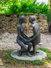 Fototapeta na wymiar Statue young couple, Castle University of Florence, Italy.