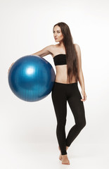 Fototapeta premium Young attractive woman exersicing