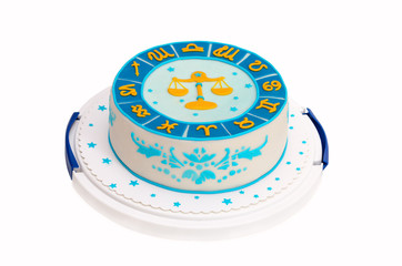 birthday cake with zodiac symbols and libra isolated on white