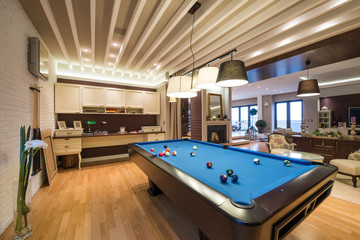 Interior of a luxury living room with pool table