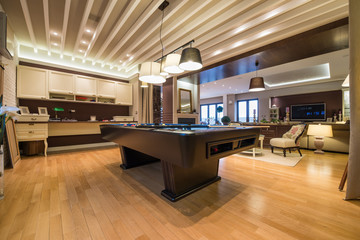 Interior of a luxury living room with pool table