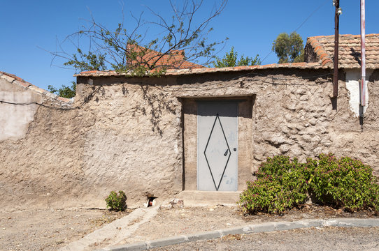 Traditional street in a small hamlet in La Mancha, Ciudad Real Province, Spain