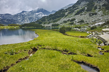 Reflection of Banderishki chukar peak in Muratovo lake, Pirin Mountain, Bulgaria