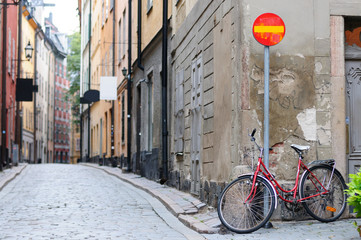 Red bicycle on old Stockholm street