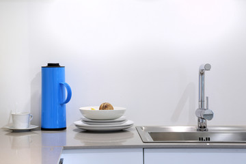 Modern kitchen room with kitchenware and utensil on counter