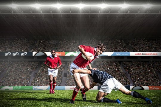 Composite image of rugby fans in arena