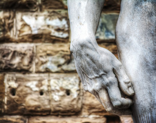 close up of Michelangelo's David hand in hdr