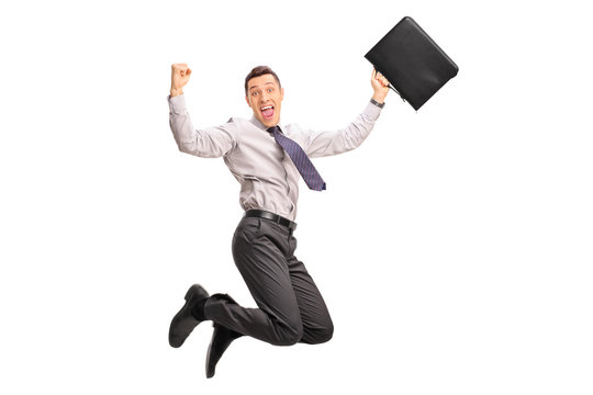 Delighted Businessman Jumping Out Of Joy