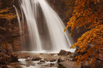 Waterfall in autumn forest