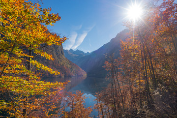 Colourful autumn forest and lake in the mountains at Konigssee