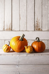 Pumpkins on wooden table