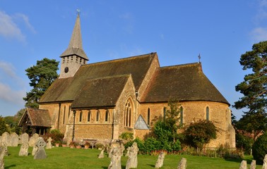 Fototapeta na wymiar A Christian Church in a Surrey village in Autumn