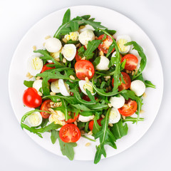 Salad with arugula on a white background