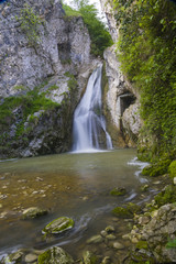 Fototapeta na wymiar waterfall near the New Athos 