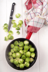 brussels sprouts with water in a pot