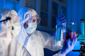 close up of scientists making test in lab