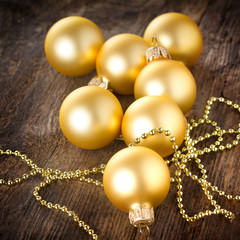 christmas balls on wooden background