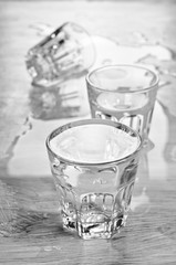 Glasses with a clear liquid