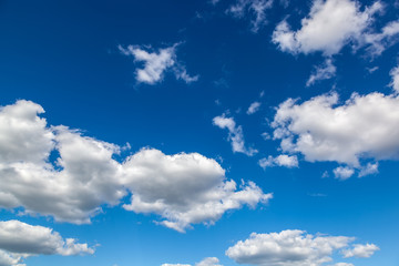Naklejka na ściany i meble Blue sky with clouds closeup
