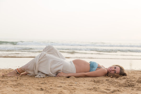 pregnant girl in the beach