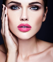 Fototapeta na wymiar sensual glamour portrait of beautiful woman model lady with fresh daily makeup with pink lips color and clean healthy skin face