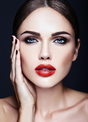 Fototapeta na wymiar sensual glamour portrait of beautiful woman model lady with fresh daily makeup with red lips color and clean healthy skin face