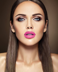 sensual glamour portrait of beautiful  woman model lady with fresh daily makeup with pink lips color and clean healthy skin face