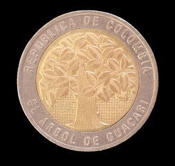 Head of a 500 colombian pesos coin depicting the tree of Guacari