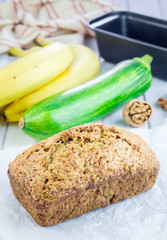 Loaf of homemade banana zucchini bread with walnuts