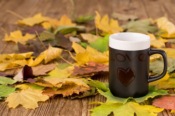 Cup of black tea with love inscription 