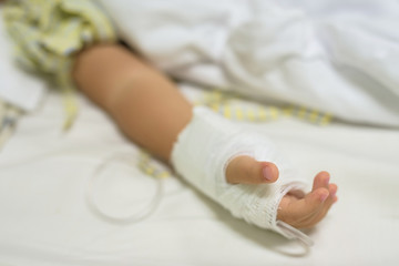 hand of sick Little boy with IV