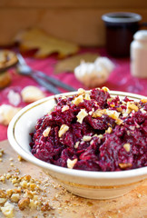 Fresh beet salad with garlic and walnuts