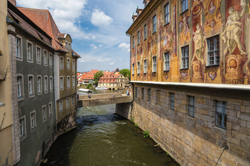 Fototapeta na wymiar Bamberg. On the right wall of the Old Town Hall (1461) with frescoes. Historic city center of Bamberg is a listed UNESCO world heritage site 
