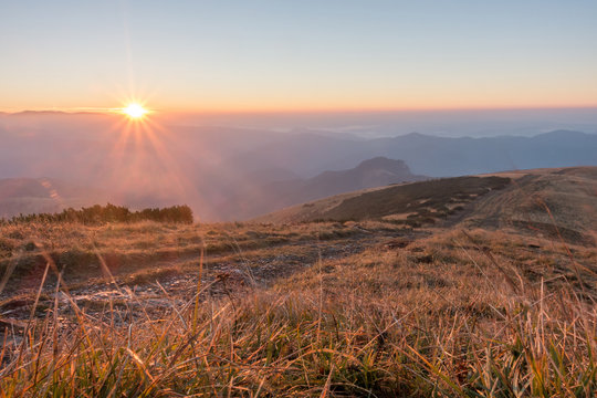 Fototapeta Amazing sunrise on mountain ridge