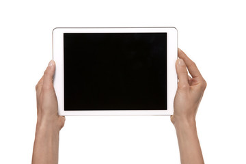 Tablet in hands. Studio shot isolated on white. 