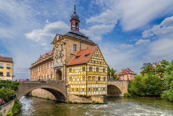 Bamberg, Germany. Old Town Hall (1461), half-timbered building Corporal House (1668) and the Upper Bridge (1453)