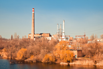 Old thermoelectric power station on the river