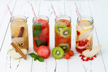 Detox fruit infused flavored water. Refreshing summer homemade cocktail. Clean eating