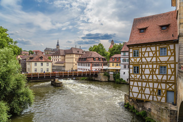 Bamberg, Germany. View of the city with a big bridge. Right - Corporal House, 1668. Historic city center of Bamberg is a listed UNESCO world heritage site