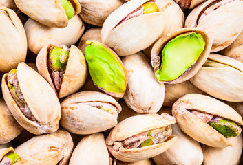 Pistachios close up background.