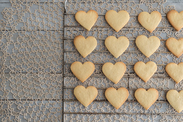 Heart shaped valentine's butter cookies cooling on the rack