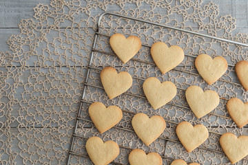 Heart shaped valentine's butter cookies cooling on the rack