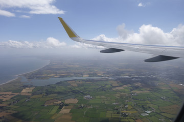 Wing of an airplane flying