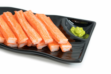 Imitation Crab Stick  in plate on white background