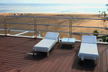 Sunbed on roof after rain