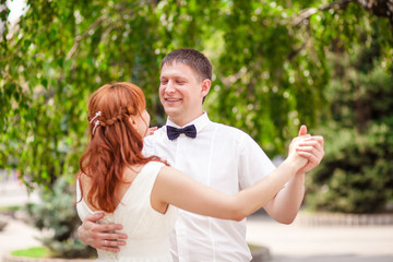 Fototapeta premium beautiful couple in the park wedding