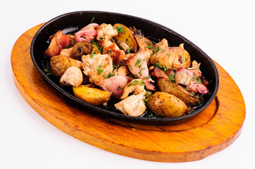 roasted meat with vegetables and potato