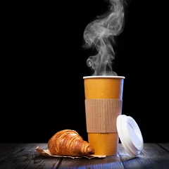 Zelfklevend Fotobehang Coffee in a paper cup © George Dolgikh