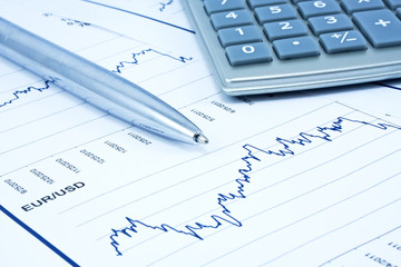 Background of business diagram, calculator and pen