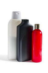 colored plastic bottles with shampoo and mask for hair